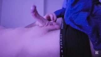 I lay down on the bed and started caressing and masturbating my cock