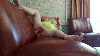 after work, the neighbor gets an orgasm and fucks herself with toys in her pussy