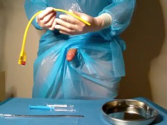 The doctor play with gloves and sounds himself