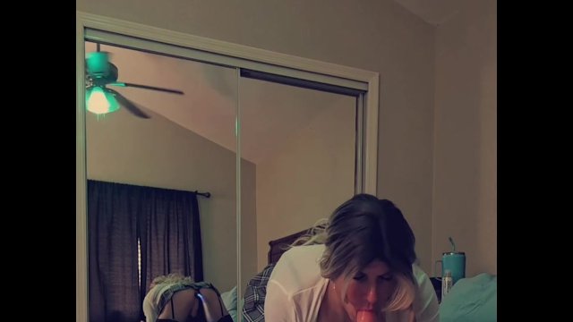 Sexy schoolgirl crossdresser with buttplug sucking dildo