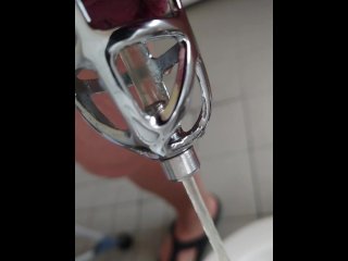 Piss in the penis cage with catheter in tights