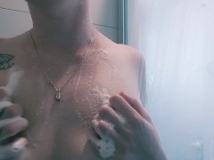 Natural blonde shows off armpits in shower