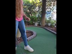 Pretty girl golfing and she completely miss the shot
