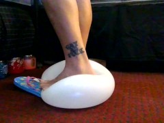 Popping Balloons With Thin Pink Strappy Blue Candy Flip Flops