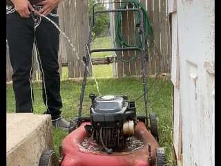 Pissing Desperately outside in Public on Top of a Lawn Mower