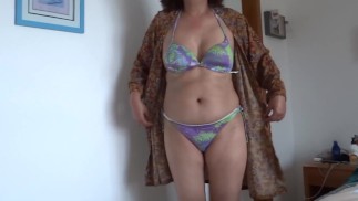 On the beach, stepmom shows off in a bikini and gets my cock really hard