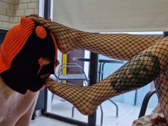 Amazing foot fetish. Slender and long legs in fishnet tights.