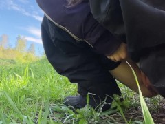 Teen pissing in nature