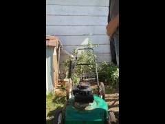 Lawn mower piss #2 (taking a desperate public piss outside on top of a different lawn mower)