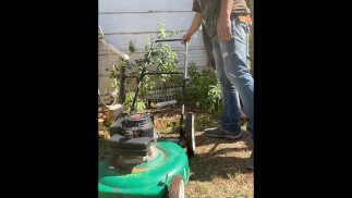 Lawn mower piss #2 (taking a desperate public piss outside on top of a different lawn mower)