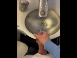 Jerking off and cumming in bathroom on a plane!