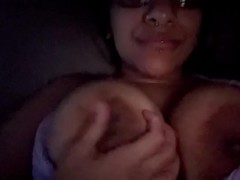 Horny girl loves playing with her tits