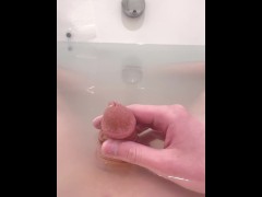 Peeing in the bath (vertical)