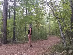 Crossdresser walks in the forest and masturbate