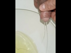 Desperate young man pissing, big erection and sprouted veins