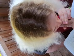 Unplanned public blowjob on a forest viewing deck, ending with a huge facial amid yellow blooms