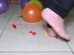 Stomping to pop Balloons