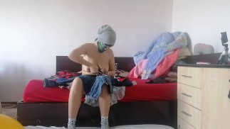 Amateur wife tries on clothes and cuts them