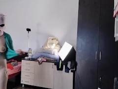 Amateur wife having fun trying on clothes and cutting them.