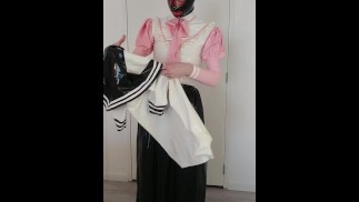 Undressing latex layers, rubber robe coat, schoolgirl sailor uniform, long skirt, stockings, panties