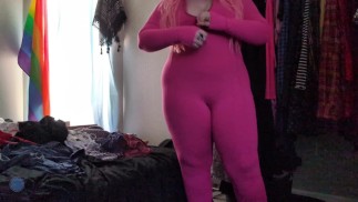 trying on this stretchy pink bodysuit