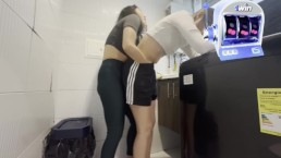 Two lesbians have a secret in the laundry room.