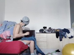 Amateur wife has fun trying on clothes and cutting them. Amateur wife dances naked around the house.