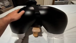 Milf angelssex320  wearing latex pants boots and playing with strapon with his husband real