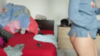 Amateur wife has fun trying on clothes and tearing them off.