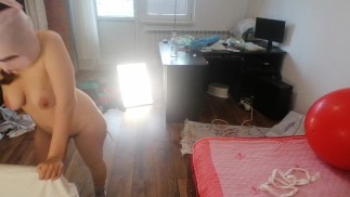 Sexy wife has fun trying on clothes and cutting them. Brunette dances naked around the house.