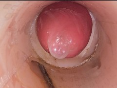 The camera in the deep pussy records a huge ejaculation of sperm into the condom