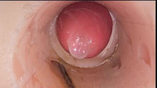 The camera in the deep pussy records a huge ejaculation of sperm into the condom