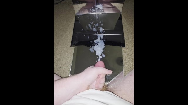 SPRAYING MIRROR WITH HUGE CUM LOAD FROM REDHEAD COCK