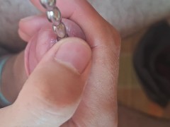 Jerking off with metal rod and bands