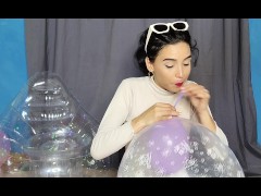 Marianna inflates a glass globe with balloons inside (full video on C4S / MV / OF / Membersite)
