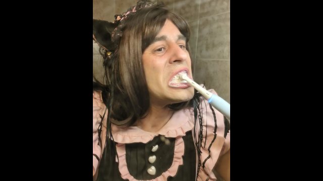 maid on front of mirror washing teets and pissing