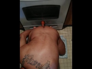 Handsome Guy Bouncing Ass Rough against Oven in Kitchen on Huge Long Dildo and taking Long Strokes